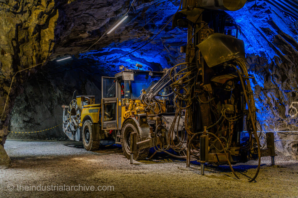 A photograph of a drilling vehicle in the LKAB mine