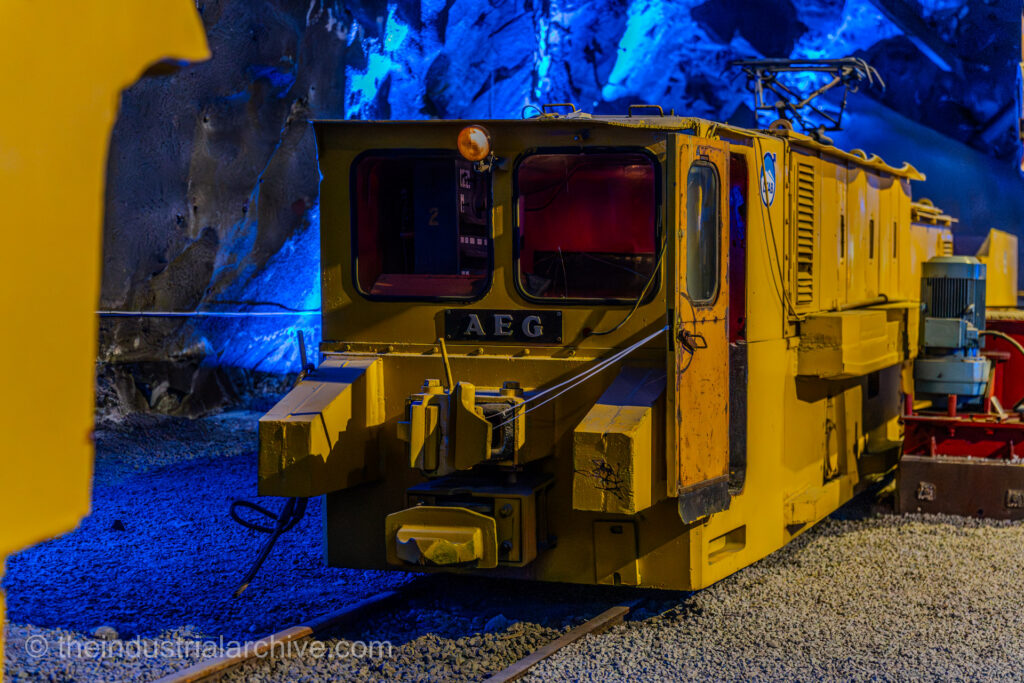 A yellow locomotive used in the LKAB iron mine in Kiruna made by the German AEG Allgemeine Elektricitäts-Gesellschaft